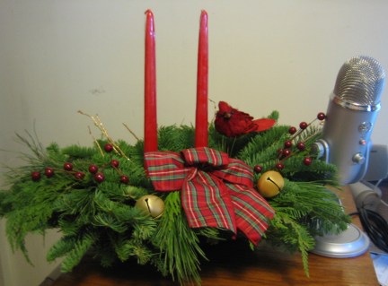 Our 2014 Christmas letter included this picture of Priscilla's desktop, with seasonal arrangement and external microphone.