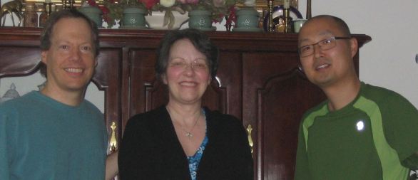 A "selfie" we took with Simon just before he left. (The celadon tea sets just above our heads were a gift from his parents on the occasion of his wedding, which I performed.)